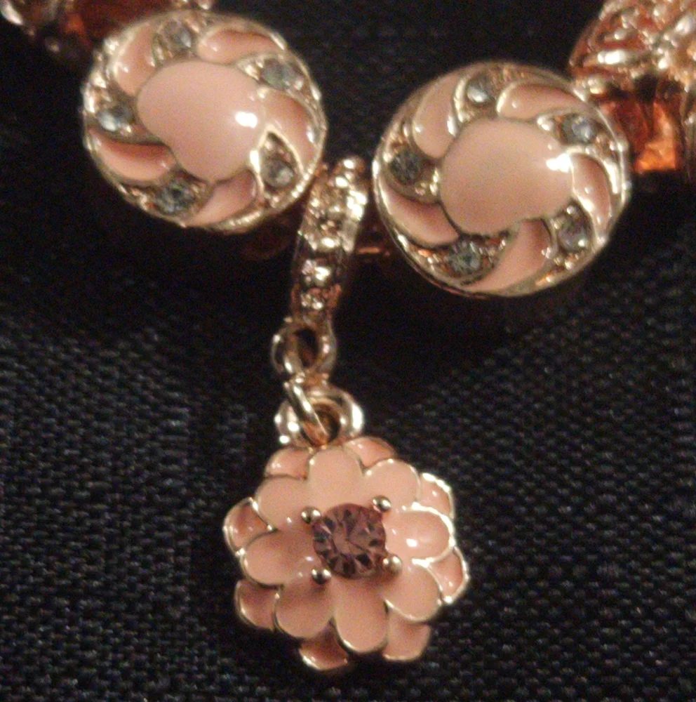 Elegant Rose Gold Bracelet with Pink Accents. ITEM No. 19-145